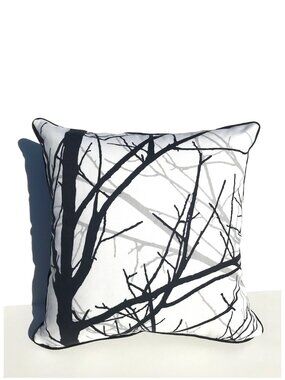 Throw pillow with piping. Zipper enclosure. Includes a down alternative insert.